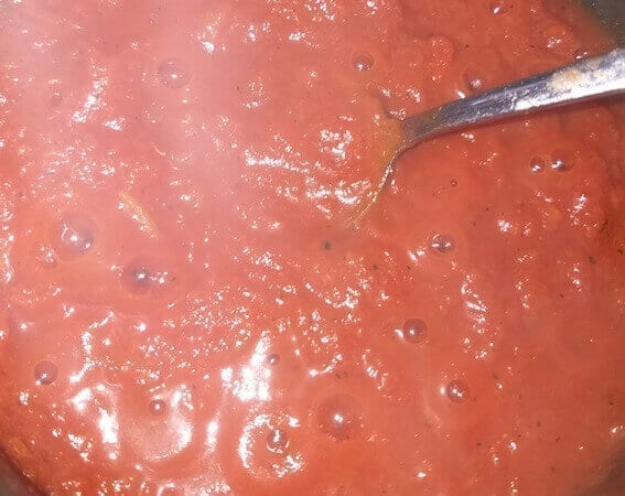 tomatoes boiling in a pot